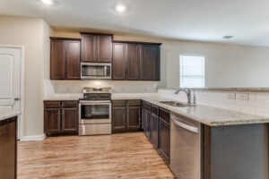 one of the kitchens in a home that we manage in the city of Plano Texas